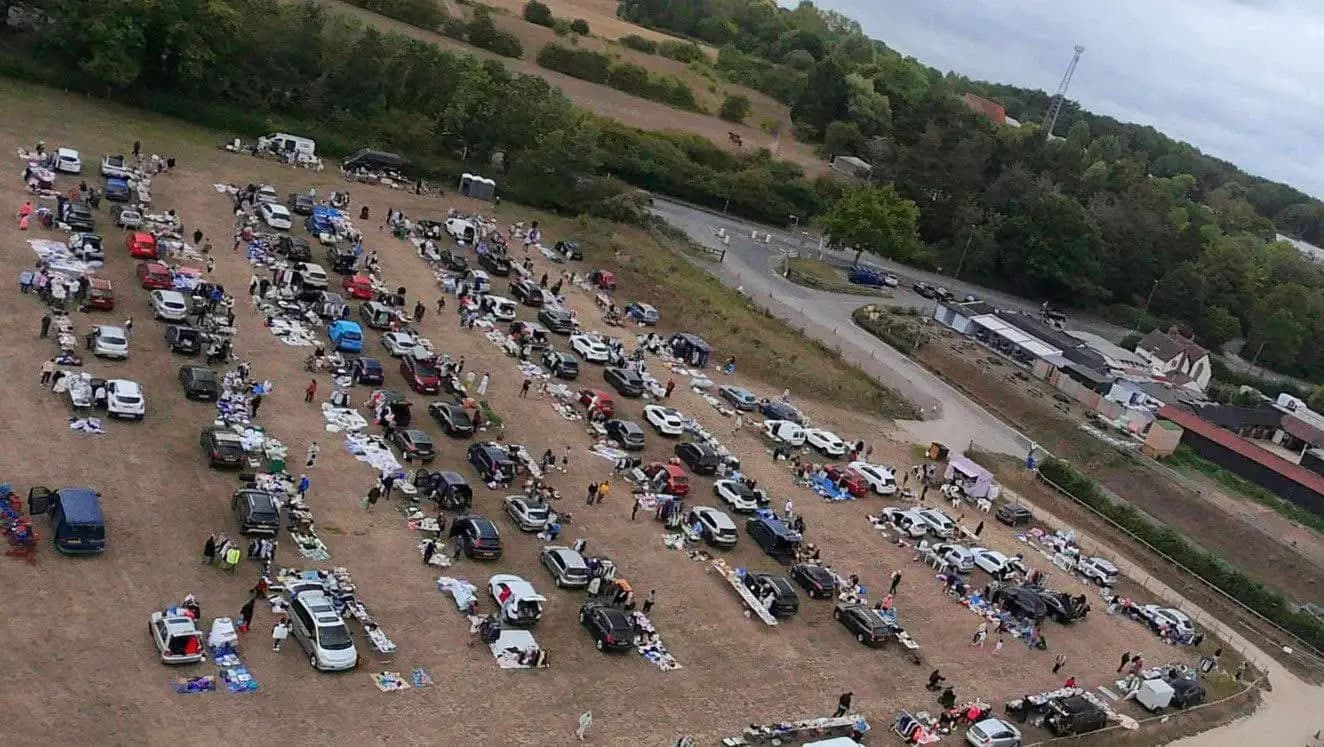 Aerial view of rows of cars, seller pitches and shoppers at Honeydale Farm Boot Sale. Source: https://honeydale.co.uk/Images/Bootsale%20photo%205.webp