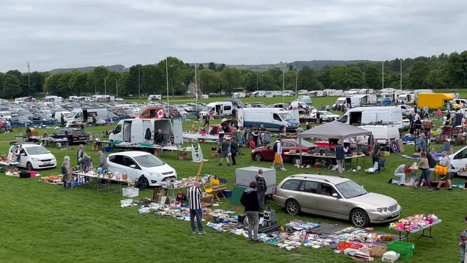Exact 27 May 2026 Corbridge Carboot Fair video frame showing cars, vans, stalls, goods and shoppers across Tynedale Park. Source: https://www.facebook.com/corbridgecarbootfair/posts/27526-its-been-the-busiest-day-in-recent-years-at-corbridge-carboot-fair-today-d/1291250689794717/