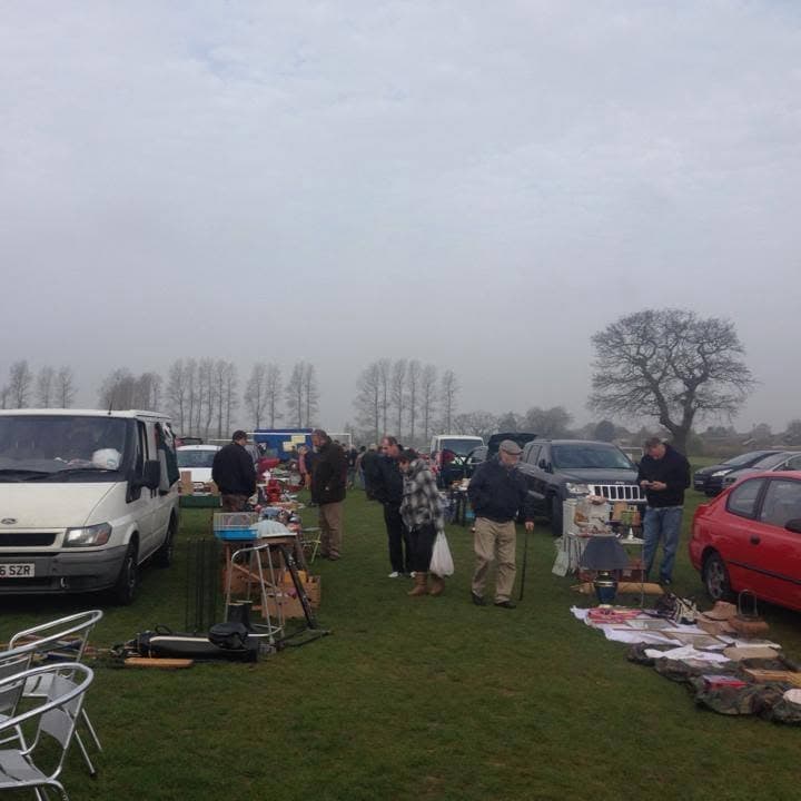 Cars, open boots, tables, goods and shoppers across the field at Hemsby Car Boot. Source: https://www.facebook.com/photo.php?fbid=834527686574257&set=pb.100057211999857.-2207520000&type=3