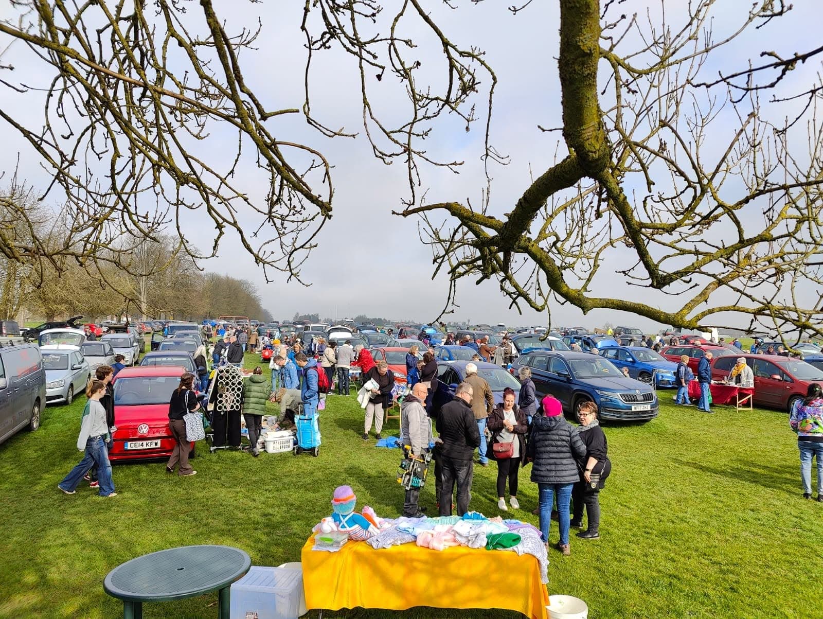 Cars, stalls, goods and shoppers across Marlborough Common Charity Car Boot Sale. Source: https://www.facebook.com/photo.php?fbid=540462798203961&set=a.415635964019979&type=3&from_lookaside=1