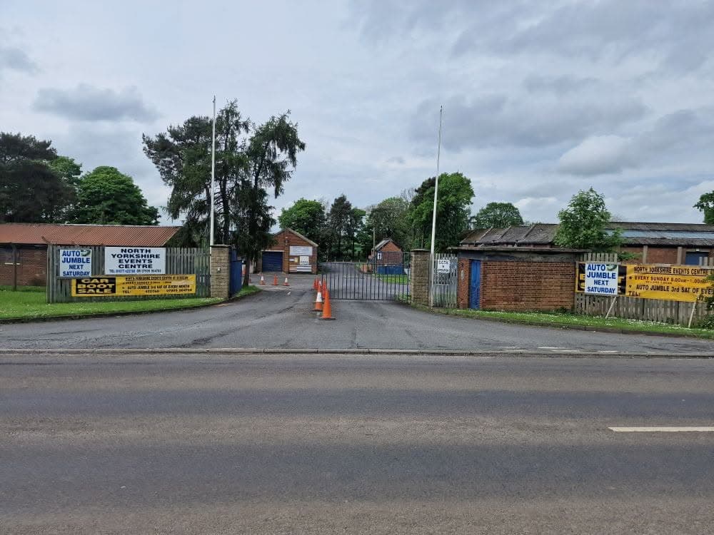 Entrance to North Yorkshire Events Centre with Scorton car boot signs Source: https://www.facebook.com/photo/?fbid=10237936078159441&set=p.10237936078159441