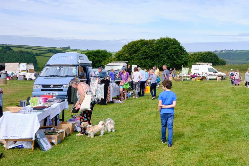 Cars, tables and shoppers at Torrington Commons Car Boot Sale Source: https://www.torringtoncommons.org/events/car-boot-sales/