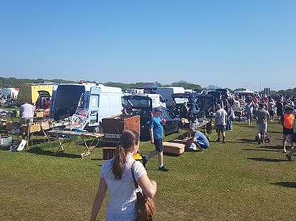 Cars, vans, sellers and shoppers across the field at Mammoth Boot Fairs in Polegate. Source: https://www.mammothbootfairs.co.uk/
