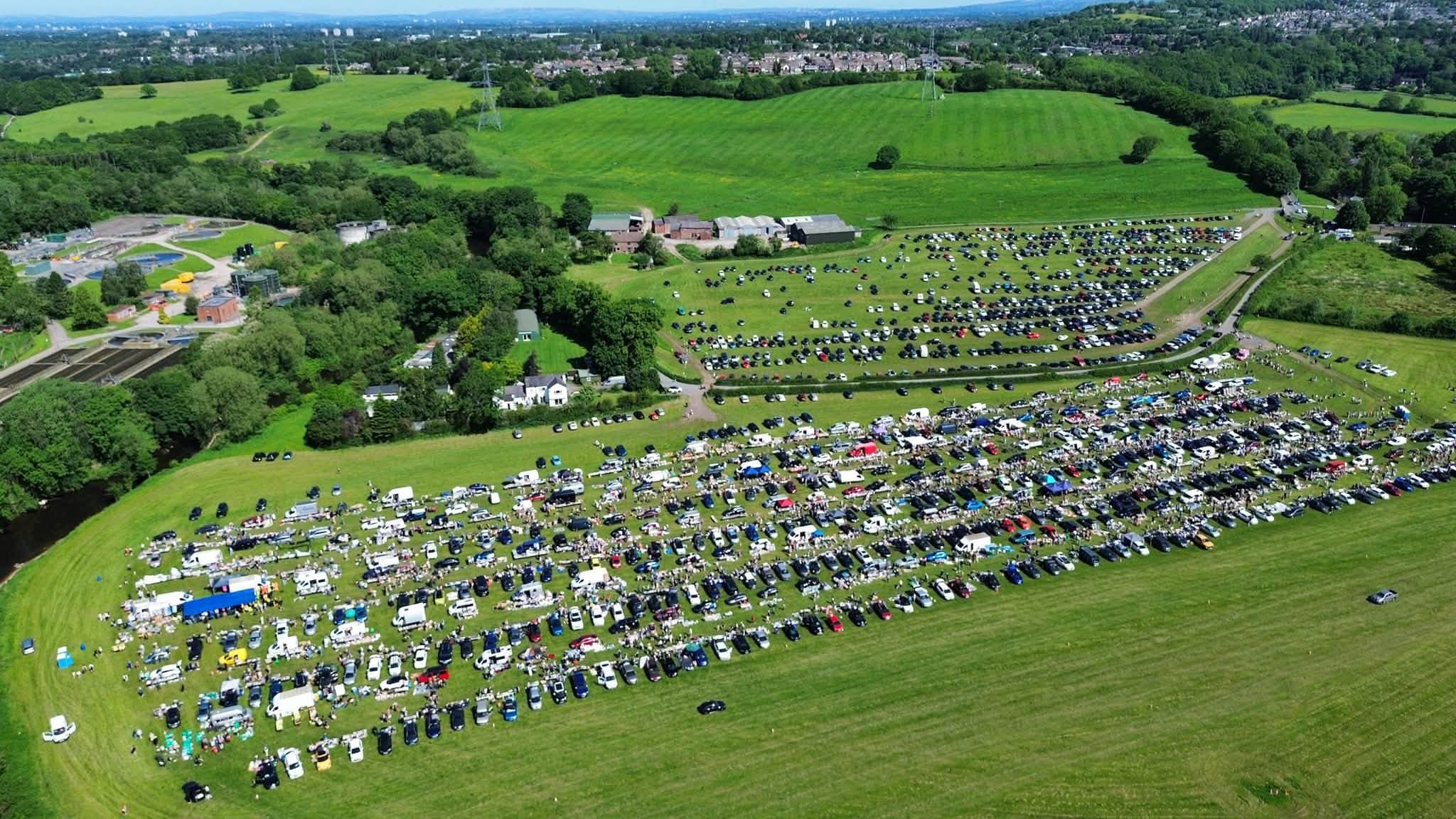 A July 2026 aerial view of The BIG Stockport Car Boot at Waterside Farm, showing rows of sellers, cars and visitors. Source: https://www.facebook.com/photo/?fbid=122229953804331384&set=pcb.122229953840331384