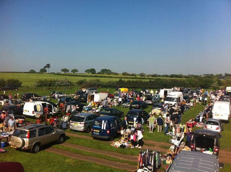 Busy Muckley Corner Car Boot Sale with rows of cars, goods and shoppers across the Hall Lane field. Source: https://directory.expressandstar.co.uk/company/952458687512576