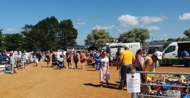 Shoppers, traders, stalls and vans at West Bay Car Boot Sale. Source: https://www.bridport-tc.gov.uk/west-bay-car-boot-sales-2025/