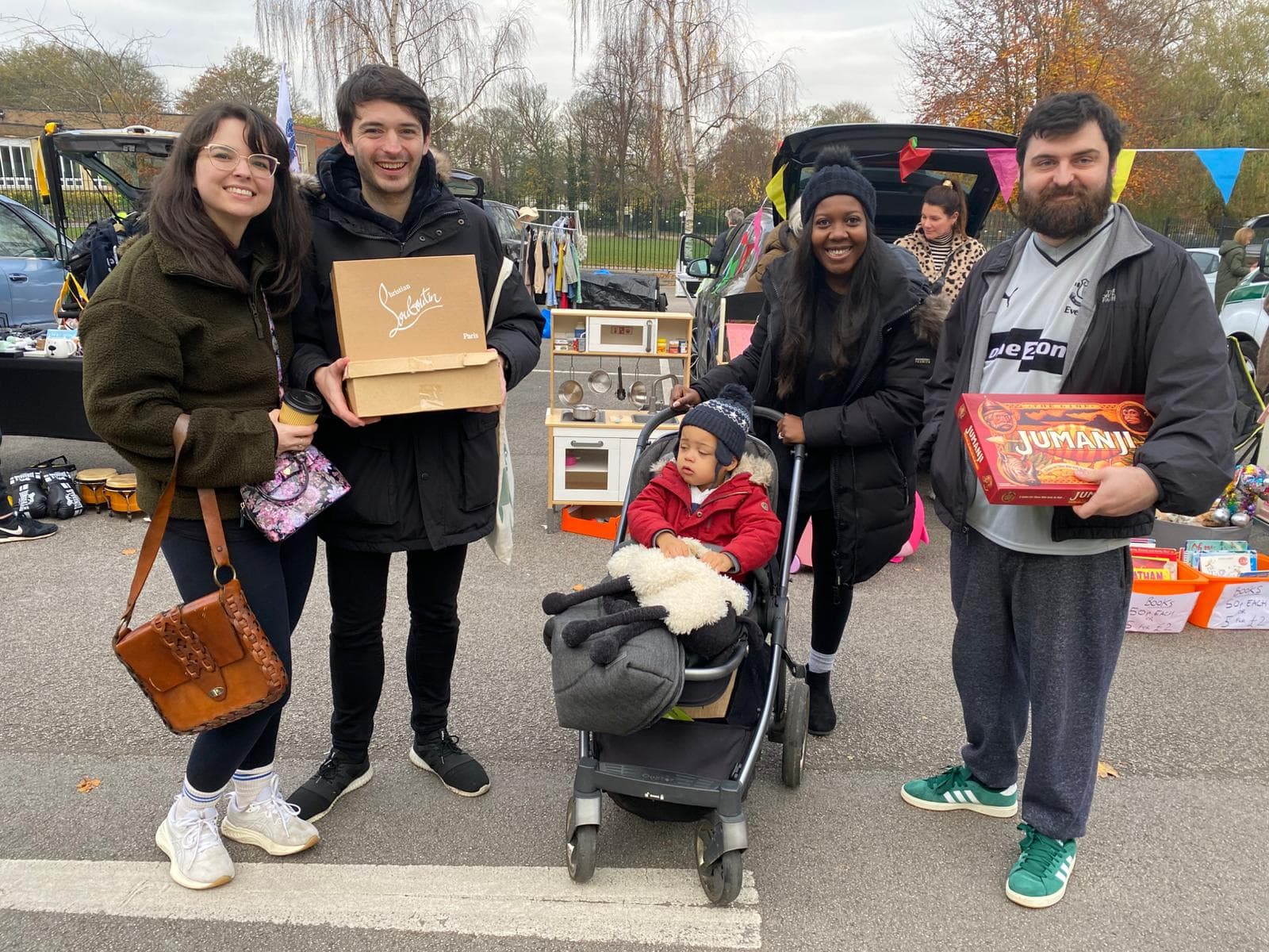 Shoppers holding purchases beside open car boots at Caldies Car Boot Sale. Source: https://www.calderstones.co.uk/i/photos/Gallery/Galleries/5429-CaldiesCarBoot/Caldies_Car_Boot_Landscape__8_.jpeg