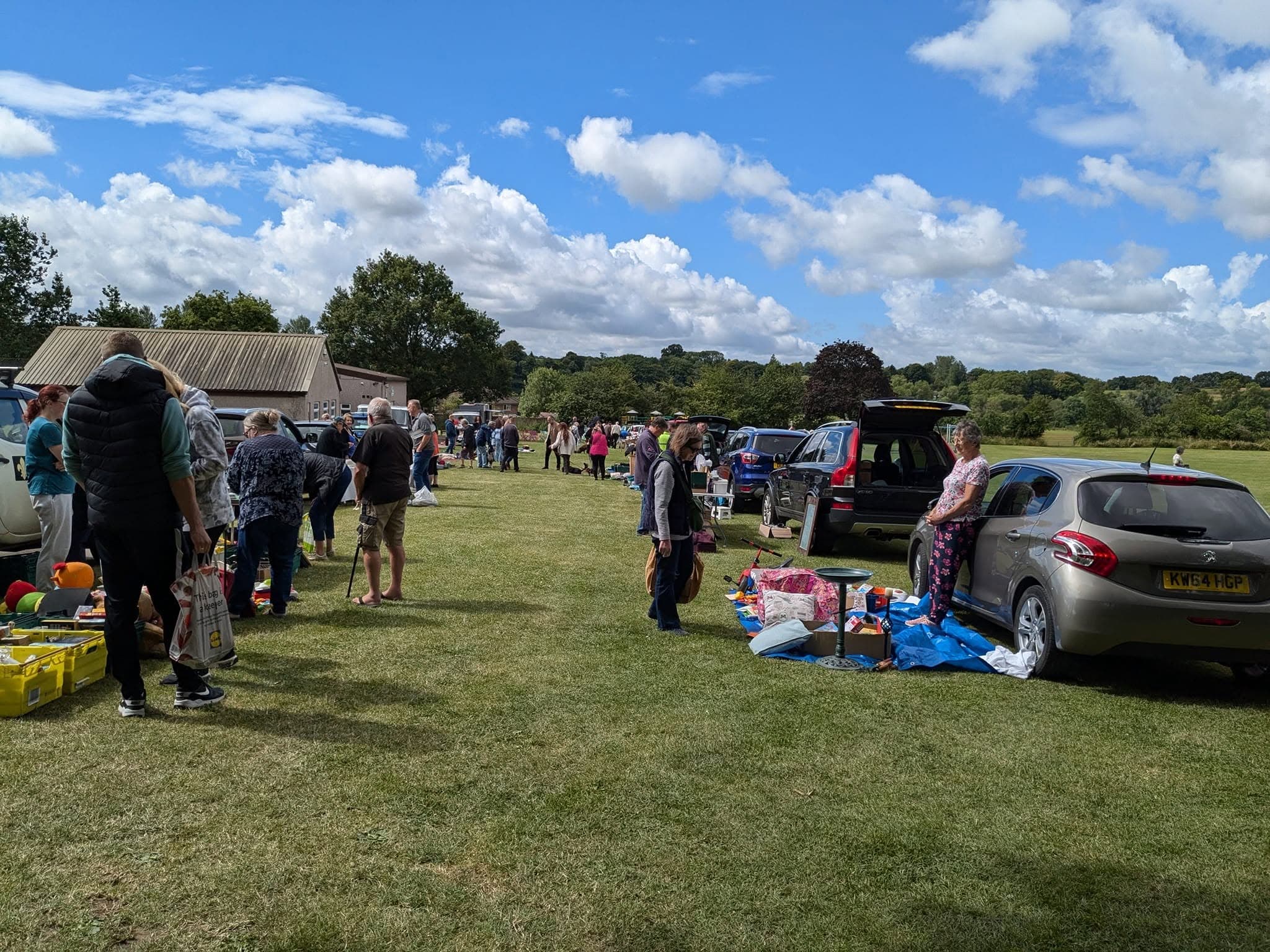 Sturminster Newton Charity Car Boot Sale with sellers, cars and shoppers at the organiser's former recreation-ground venue Source: https://www.facebook.com/photo.php?fbid=122160573098194507