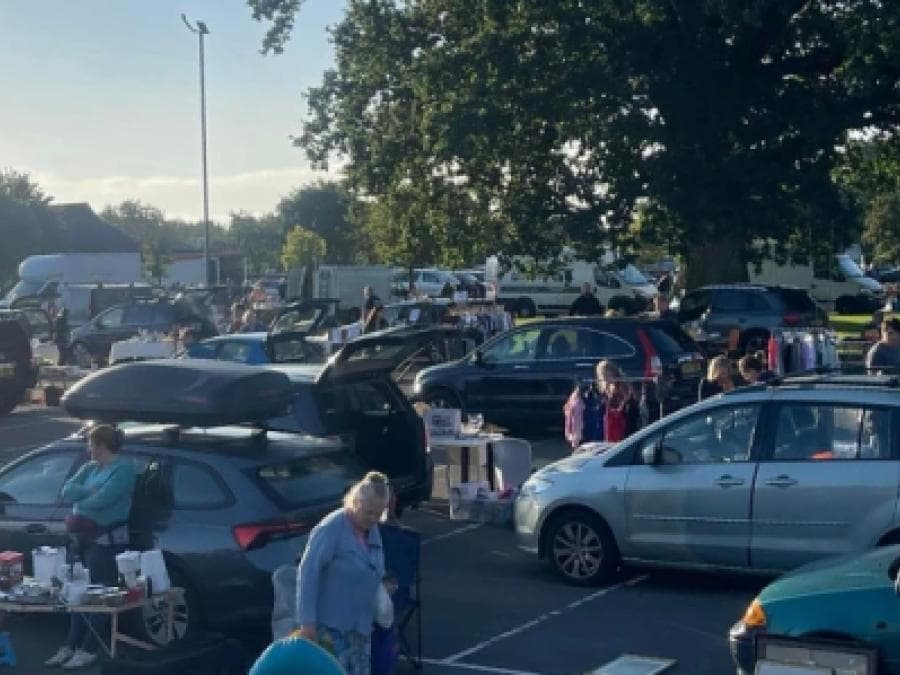 Cars, open boots, seller tables and shoppers at Standerwick Car Boot Source: https://www.thenearfield.com/venue/frome-market/event/standerwick-car-boot-flea-market-sbb6sqp5j4xstnkf