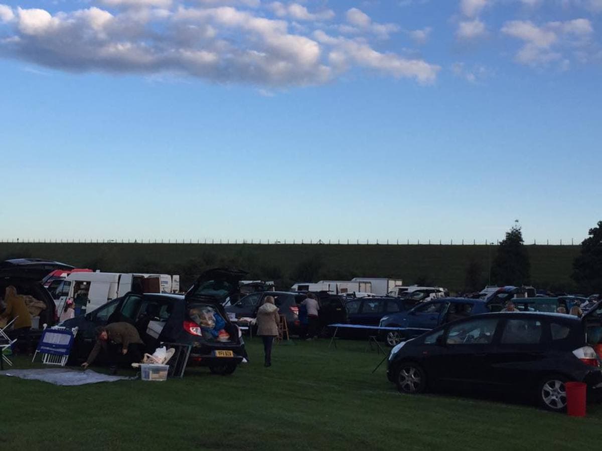 Cars, open boots and shoppers at Shepperton Car Boot Sale Source: https://www.sheppertoncarboot.co.uk/assets/img/large_30581540_996863403797484_2770865865745235968_n.jpeg