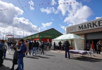 Weekend visitors and traders among the indoor and outdoor stalls at Barras Market. Source: https://market.barrowland.co.uk/pages/thebarras