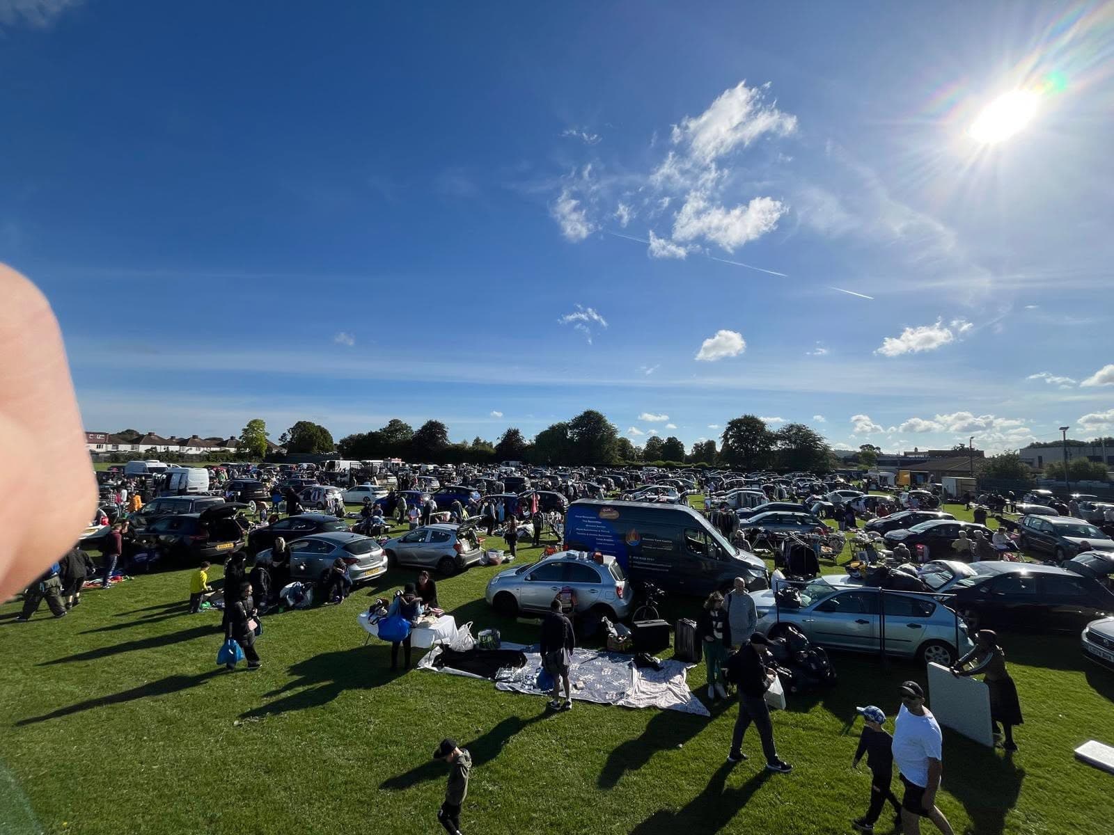 A busy Ruislip Queensmead car boot sale with rows of cars, stalls and shoppers Source: https://www.facebook.com/photo.php?fbid=1648486597276895