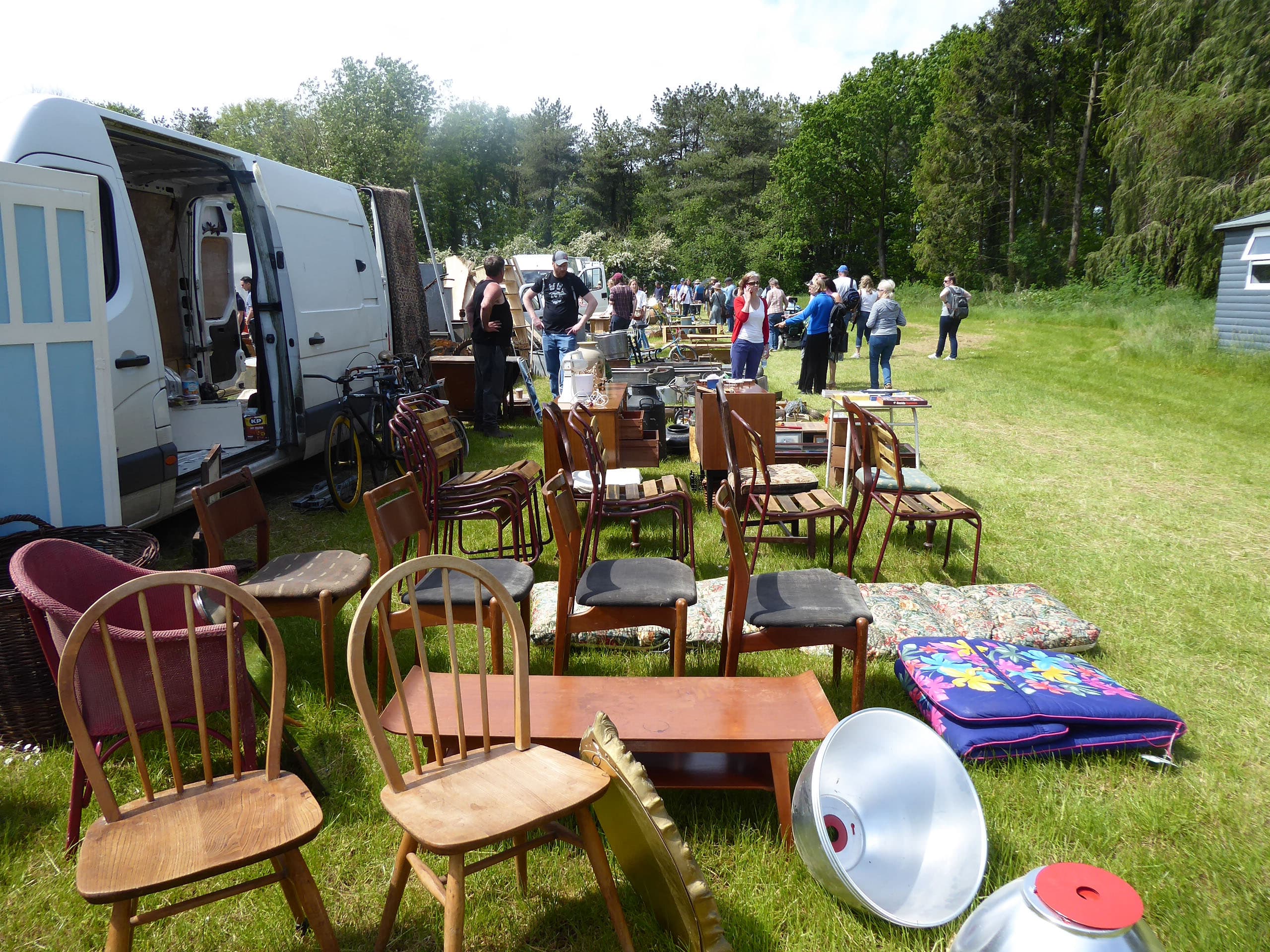 Visitors browsing furniture and vintage goods at the Giant Shepton Flea Market Source: https://www.sheptonflea.com/wp-content/uploads/2023/05/Browsers-6.jpg