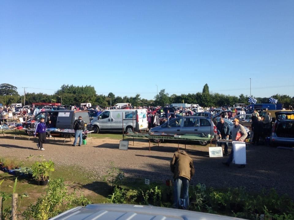 Late Riser Car Boot Sale with cars, stalls and shoppers Source: https://www.findcarboot.co.uk/late-risers-car-boot-sale/
