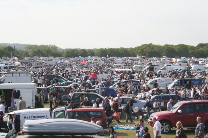 Wide view of Dunton Boot Sale with cars, stalls and shoppers (official archival gallery photograph). Source: https://duntonbootsale.com/gallery/
