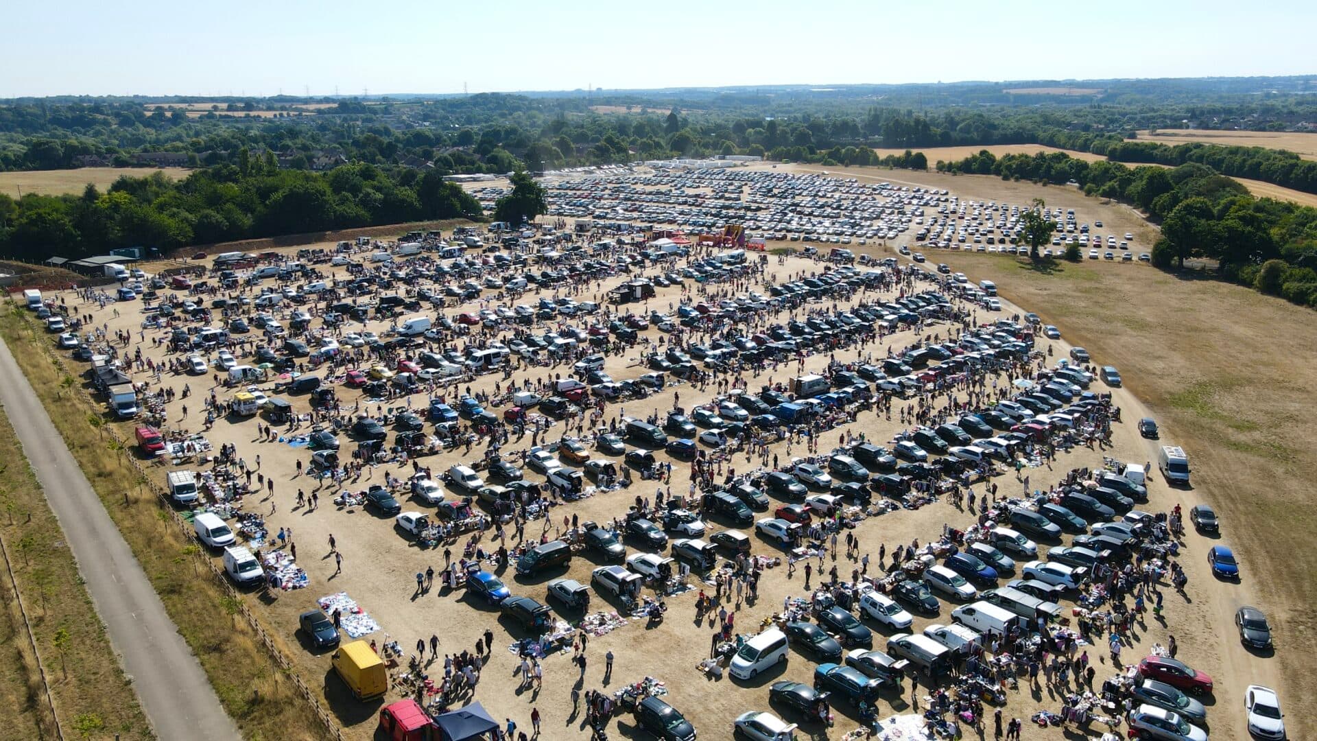 Aerial view of Great Amwell Car Boot Sale with cars, sellers and shoppers at Hillside Farm. Source: https://capitalbootsales.co.uk/app/uploads/2023/01/Photo_6553662_DJI_62_jpg_5455471_0_202287101152_photo_original.jpg.jpg