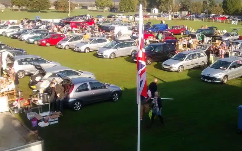 West Midlands Showground car boot sale with rows of cars and shoppers Source: https://www.westmidshowground.co.uk/assets/d21zaG93Z3JvdW5k/images/car-boot-20/carboot-02.jpg