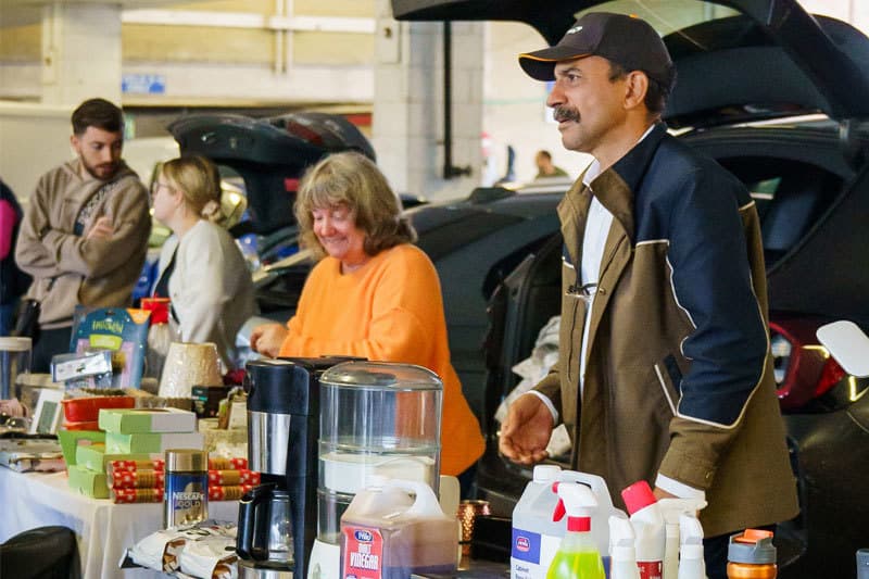 Sellers and shoppers beside open cars at Rushmoor Car Boot Sale in Aldershot. Source: https://www.rushmoor.gov.uk/media/rufl2uon/car-boot-sellers.jpg?width=800&height=533&v=1db305e02ba8980
