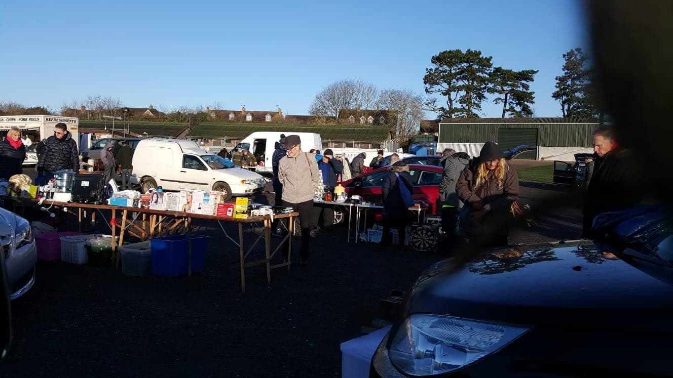 Archival organiser photo showing cars, sellers and shoppers at Stratford Racecourse Car Boot Sale. Source: https://www.facebook.com/photo.php?fbid=2855807054508834