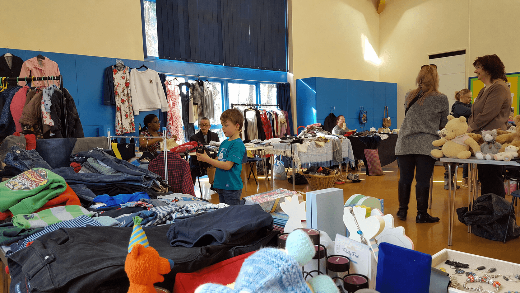Shoppers browsing tables and clothing rails at Lyppard Hub indoor car boot sale Source: https://lyppardhub.co.uk/wp-content/uploads/2026/04/Indoor-Car-Boot-Sale.png