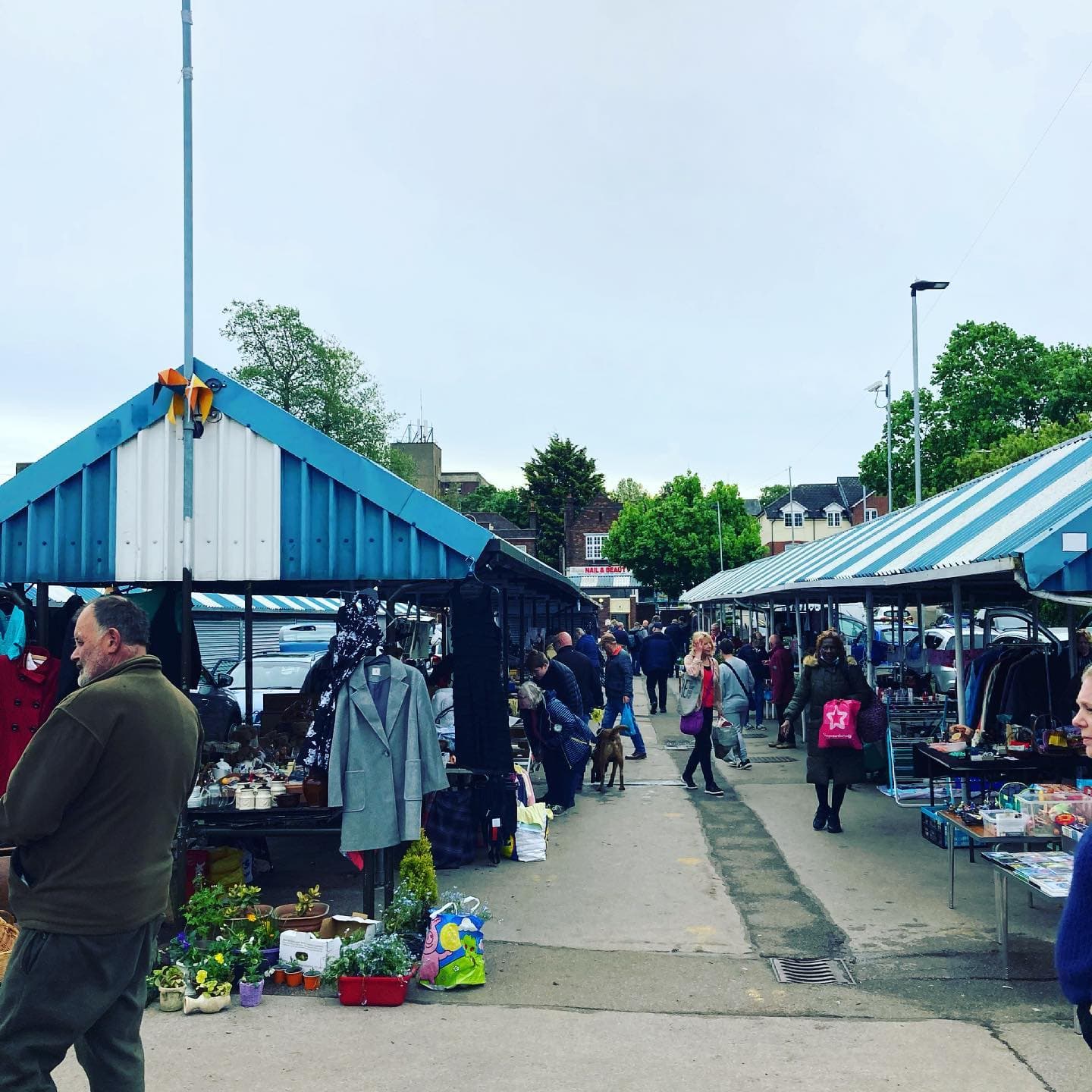 Covered lanes, cars, sellers and shoppers at Hitchin Sunday Market and Car Boot. Source: https://www.facebook.com/hitchinmarkets/posts/take-in-hitchin-car-boot-and-sunday-market-today-plenty-of-bargains-and-bric-a-b/4263191543720517/