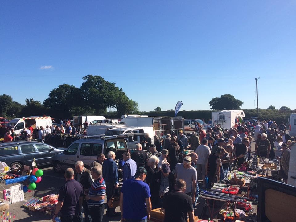 Buyers browsing the outdoor stalls at Rufforth Auto Jumble Source: https://www.rufforthautojumble.com/wp-content/uploads/2016/12/IMG_0082.jpg