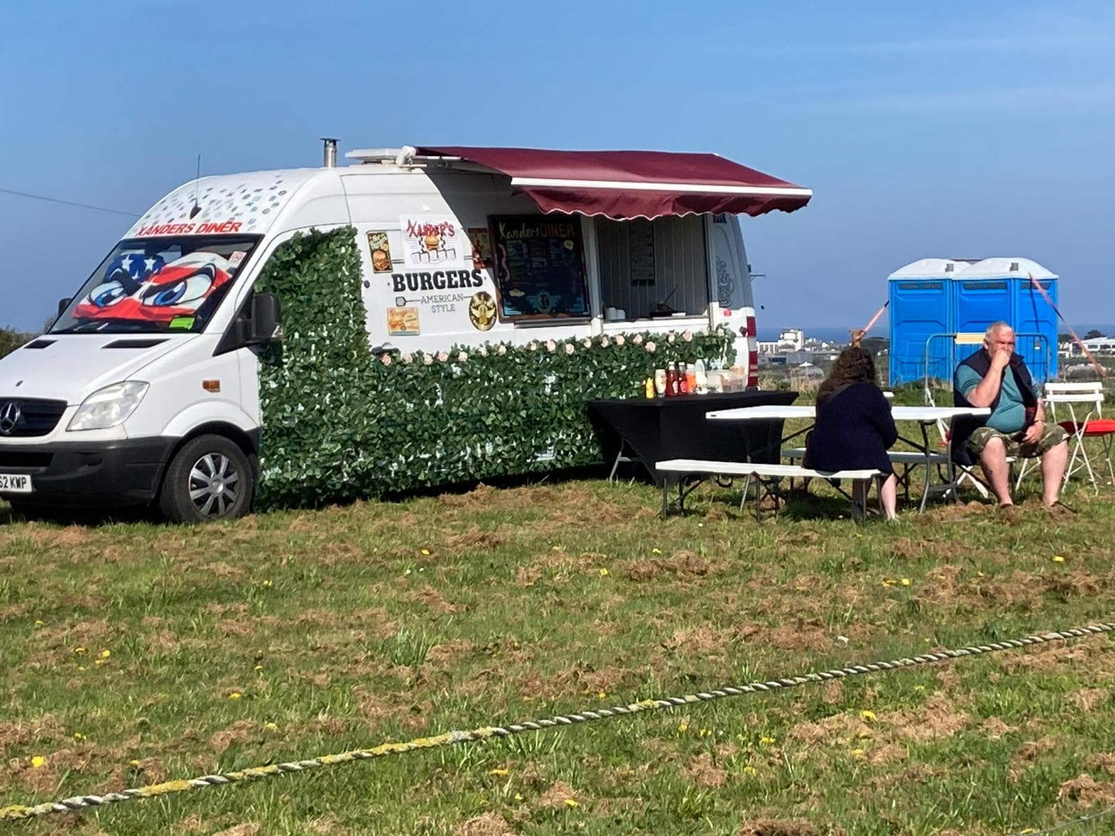 A food van, visitors and portable toilets at Newquay Chapel Farm Car Boot Sale Source: https://www.carbootscornwall.co.uk/locations/newquay