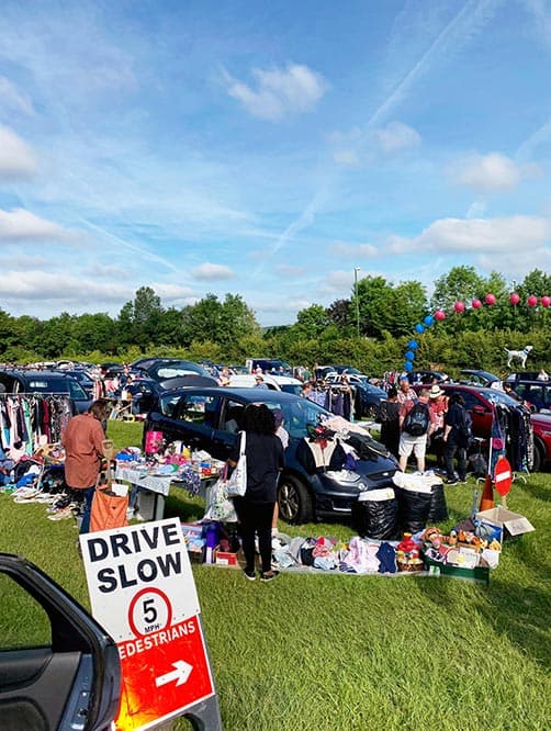 Buyers browsing stalls beside cars at Horsham Car Boot Sale in Faygate Source: https://www.horshamcarbootsale.co.uk/shared/images/content/bus_673/Horsham_Car_Boot_Sale3_Gallery.jpg