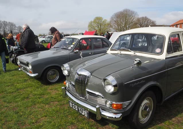 Classic cars, autojumble pitches and visitors on the Rickinghall Village Hall playing field Source: https://www.rickinghallvh.com/autojumble